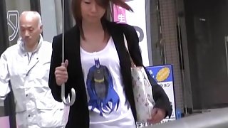 Asian babe in a short skirt gets a street sharking.