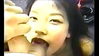 Dark haired Asian chick with slim body gives nice amateur blowjob