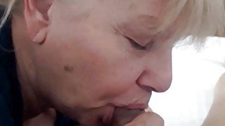 Beautiful granny sucks cock.