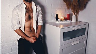 A buff handsome man in a white shirt and with a small dick jerks off loudly at the camera. 4K VIDEO