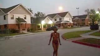 Skanky ghetto whore walks about neighborhood all naked