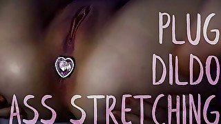 Ass stretching. Plug. Dildo. Close Up