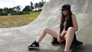 Naughty amateur teen plays with her tight cunt in the park