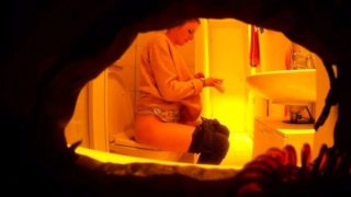 Sexy slender amateur milf caught peeing on hidden cam