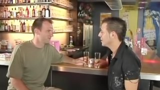 Two horny guys fucking in a bar