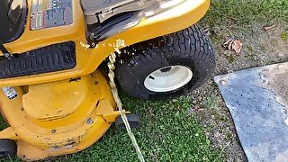 Amateur Brian peeing pissing on a mower to wash it