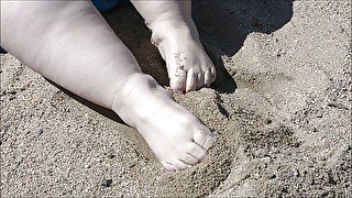 Foxy Rose feet in the sand