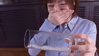 Asian milf sucks a cock and manages to milk it dry in a glass