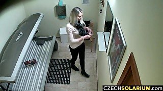 Girl relaxes in solarium not knowing about hidden cams