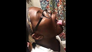 Quick blowjob by sexy ebony with glasses