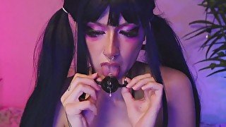 Hot goth bitch with a gag , plays with drool and sucks her favorite dildo