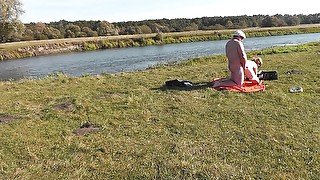 Wild beach. Nudist beach. Lover fucked doggy style blonde Milf on river bank Outdoor. Couple naked in public outside doggy style