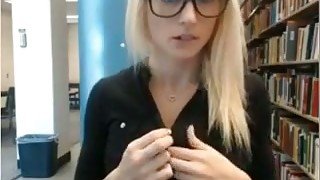 Cute nerdy auburn girl in black blouse was ready to masturbate in library