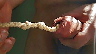 STUFFING MY COCK WITH A ROPE