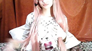 Horny pink-haired babysitter masturbates on the webcam