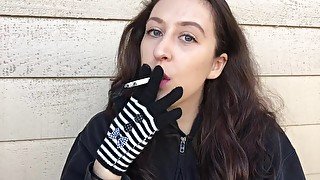 Sexy Goddess D Smoking Outside in the Cold in Cute Striped Gloves