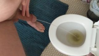 Struggling to pee with half hard cock after hot masturbation session