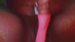 Black girl playing with her pink vibrating dildo