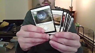 Nerd Open a Pack of Trading Cards