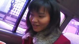 Hot asian babe in car having fun