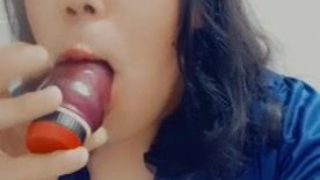 Sissy deep throating a fake penis