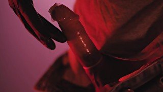 Handjob in rubber gloves. Nurse black rubber gloves jerking off my cock in a condom. Cum in condom