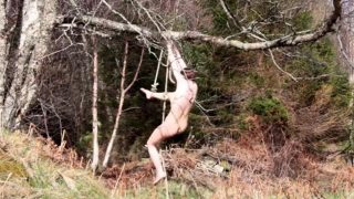 Naked self-bondage in the woods gone wrong.