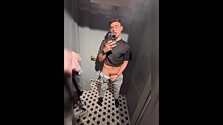 Cute teen playing his cock in a dressing room