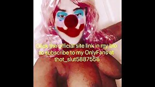 Sexy clown shows off huge tits on slide show