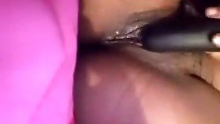 Ebony girl playing with her wet pussy and squirt