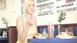 Delicious gal takes off her bra while eating lunch out with guy