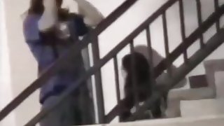 Voyeur tapes a couple having sex on public stairs outside