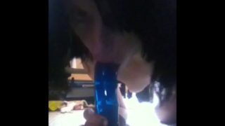 Sucking on "big blue" dildo II