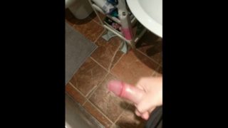 Jerking uncut cock with saliva