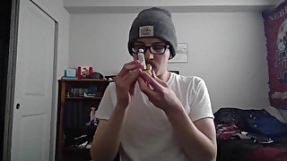 Cute Young Nerd Smoking a Bowl