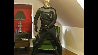 wetsuited lucha libre with skeleton and pantyhose stocking mask