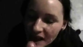 Horny brunette licks hard cock at home