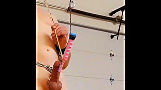 Bondage slave shoots a massive cum shot in slow motion!