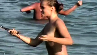 Voyeur girl naked on public beach