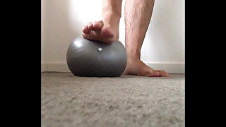 Super squishy gym ball under my big male feet tiny ball makes my feet feel enormous - MANLYFOOT