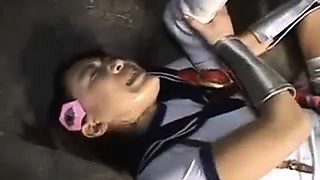 Japanese schoolgirl is tied up to be a sex slave and tortur