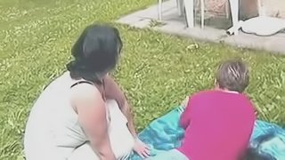 Chubby Brunette Mom Outdoors by young Guy