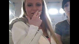 Slutty teens smoking a cigarettes in close up video