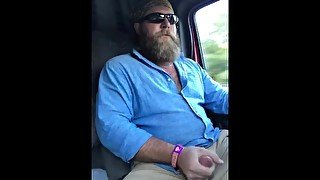 horny hairy trucker beats off fat meat while driving