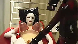 Heavy rubber suction treatment with big tits in clinic room - femdom gasmask mistress and her slave