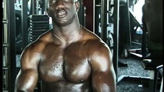 Hung black body builder shows off his physique while getting kinky