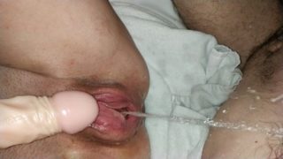 fully shaved pussy squirts and pees on man