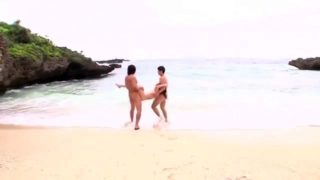 Lustful Japanese wife enjoys a wild threesome on the beach