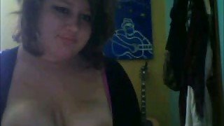 Slutty brunette milf is willing to flash her boobs on webcam