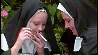 Randy nuns having a meal outdoors